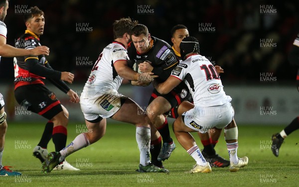 011217 - Dragons v Ulster - Guinness PRO14 - Adam Warren of Dragons is tackled by Stuart McCloskey and Christian Leali'ifano of Ulster