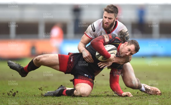 030319 - Dragons v Ulster - Guinness PRO14 - Adam Warren of Dragons is tackled by Stuart McCloskey of Ulster