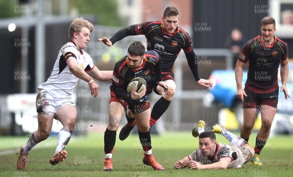 030319 - Dragons v Ulster - Guinness PRO14 - Jordan Williams of Dragons is tackled by Rob Lyttle of Ulster
