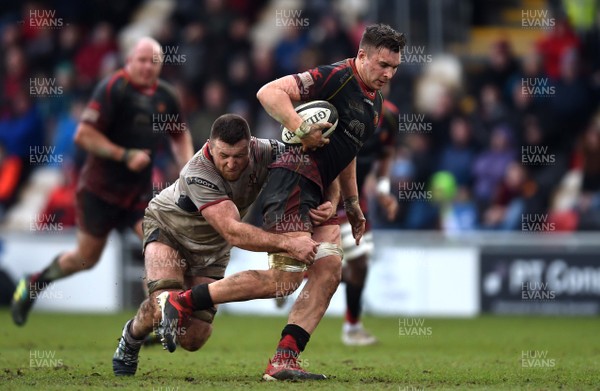 030319 - Dragons v Ulster - Guinness PRO14 - Taine Basham of Dragons is tackled by Alan O’Connor of Ulster