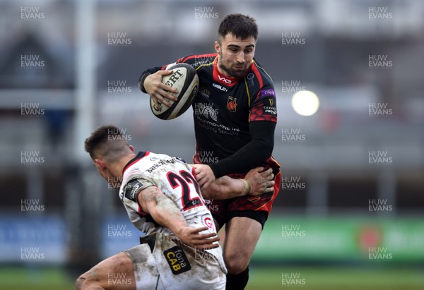 030319 - Dragons v Ulster - Guinness PRO14 - Jordan Williams of Dragons is tackled by James Hume of Ulster