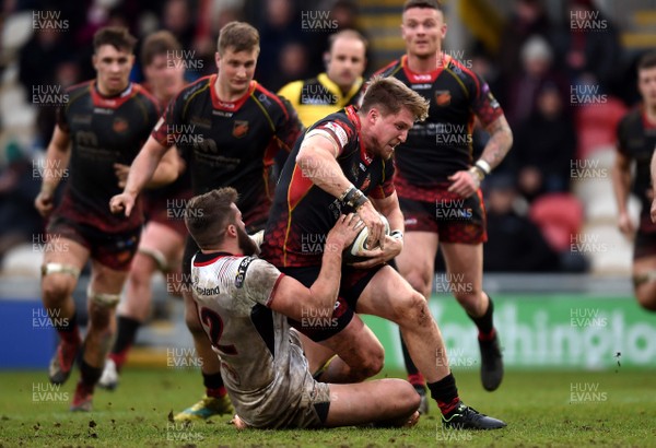 030319 - Dragons v Ulster - Guinness PRO14 - Tyler Morgan of Dragons is tackled by Stuart McCloskey of Ulster