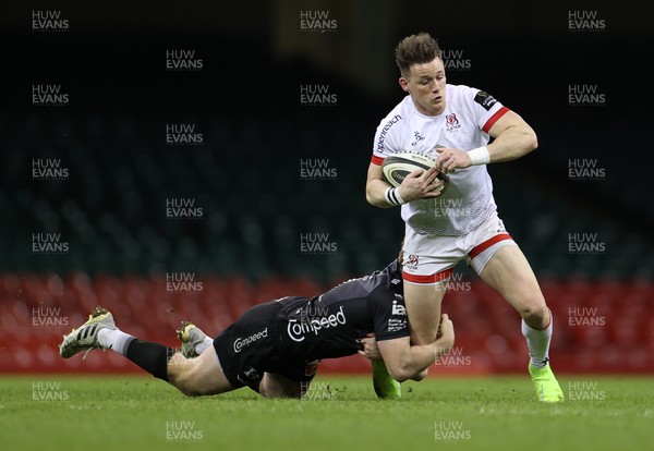 130321 - Dragons v Ulster - Guinness PRO14 - Stewart Moore of Ulster is tackled by Aneurin Owen of Dragons