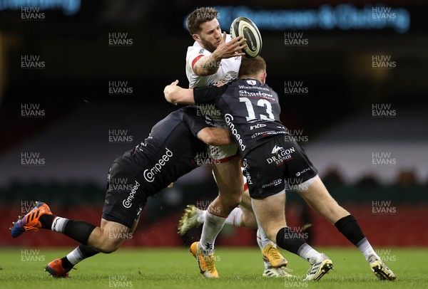 130321 - Dragons v Ulster - Guinness PRO14 - Stuart McCloskey of Ulster is tackled by Brok Harris and Aneurin Owen of Dragons