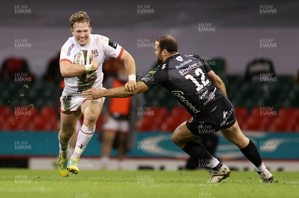 130321 - Dragons v Ulster - Guinness PRO14 - Stewart Moore of Ulster is tackled by Jamie Roberts of Dragons