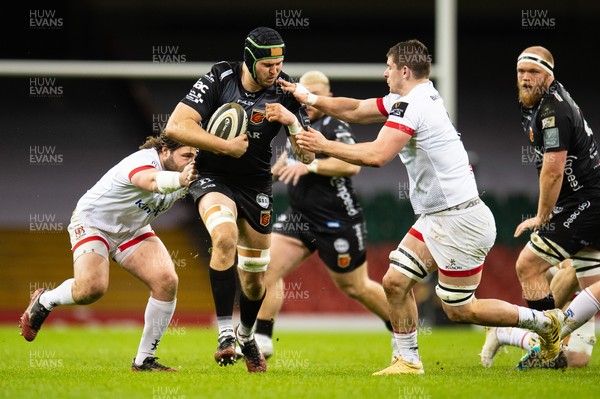 130321 - Dragons v Ulster - Guinness PRO14 - Joe Maksymiw of Dragons is tackled by John Andrew of Ulster and Nick Timoney of Ulster
