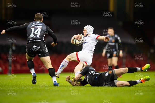 130321 - Dragons v Ulster - Guinness PRO14 - Michael Lowry of Ulster is tackled by Rhodri Williams of Dragons