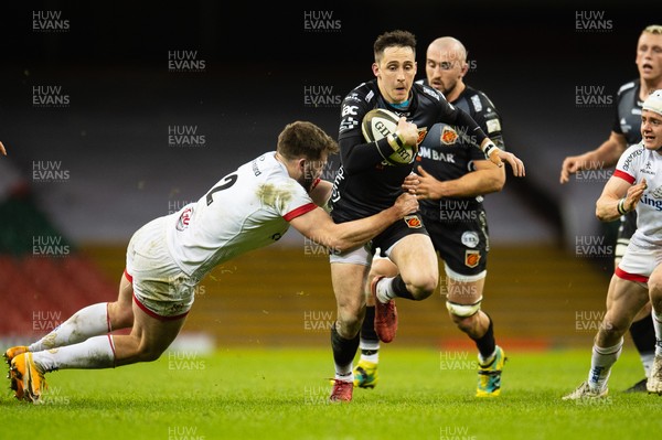 130321 - Dragons v Ulster - Guinness PRO14 - Sam Davies of Dragons is tackled by Stuart McCloskey of Ulster
