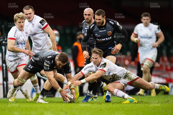 130321 - Dragons v Ulster - Guinness PRO14 - Harrison Keddie of Dragons and Stewart Moore of Ulster compete for the loose ball