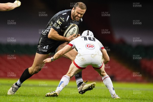 130321 - Dragons v Ulster - Guinness PRO14 - Jamie Roberts of Dragons is tackled by Michael Lowry of Ulster