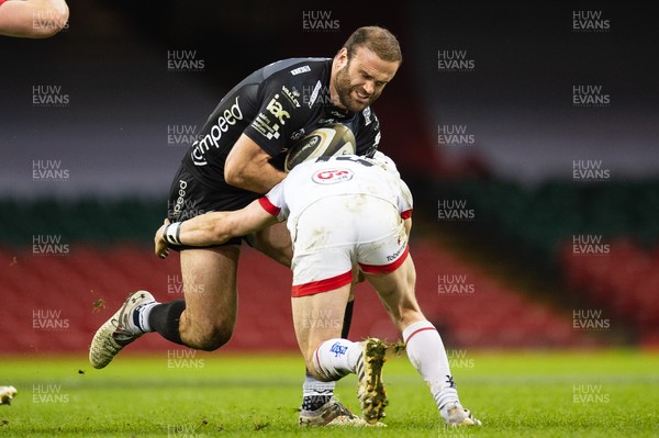 130321 - Dragons v Ulster - Guinness PRO14 - Jamie Roberts of Dragons is tackled by Michael Lowry of Ulster
