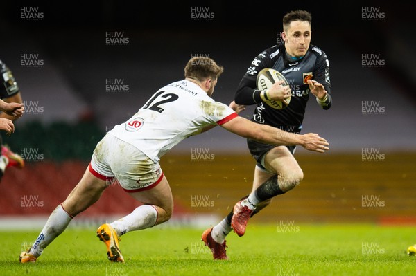 130321 - Dragons v Ulster - Guinness PRO14 - Sam Davies of Dragons is tackled by Stuart McCloskey of Ulster