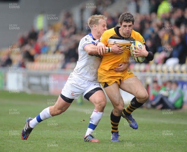 161113 - Newport Gwent Dragons v London Wasps - LV Cup -Ashley Smith of Newport Gwent Dragons tackles Jonah Holmes of London Wasps