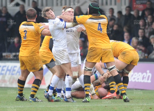 161113 - Newport Gwent Dragons v London Wasps - LV Cup -Steffan Jones of Newport Gwent Dragons is punched by Esteban Lozada of London Wasps after fights broke out on the pitch at Rodney Parade after the intensity of the game increased