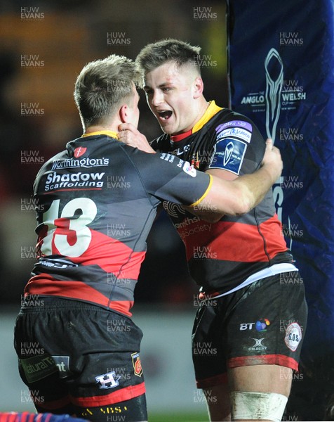 020218 - Dragons v Worcester Warriors - Anglo Welsh Cup -  Jarryd Sage is congratulated by Connor Edwards