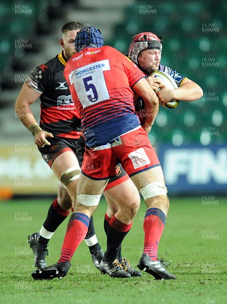 020218 - Dragons v Worcester Warriors - Anglo Welsh Cup -  Nicky Thomas is tackled Andrew Kitchener