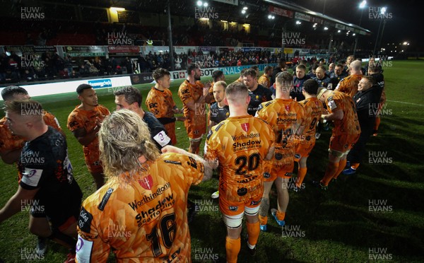 131219 - Dragons v Worcester Warriors, European Challenge Cup - Dragons players applaud the Worcester Warrior team and the fans at the end of the match