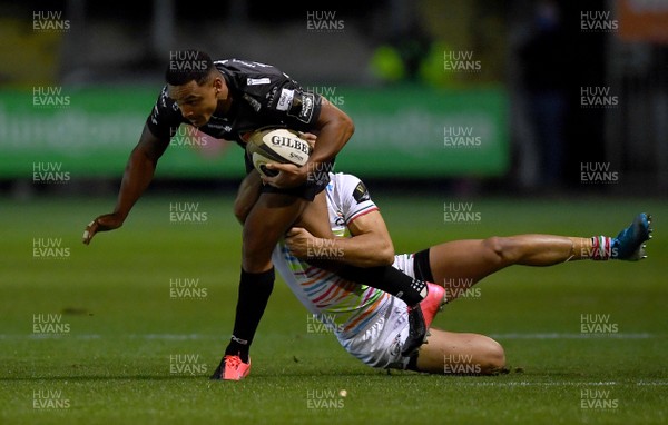 091020 - Dragons v Zebre - Guinness PRO14 - Ashton Hewitt of Dragons is tackled by Jacopo Trulla of Zebre