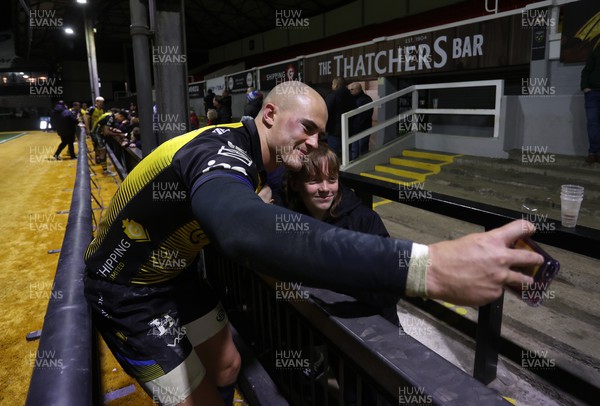 290324 - Dragons v Zebre - United Rugby Championship -  Jared Rosser of Dragons with fans at full time