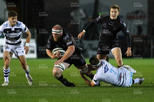 301119 - Dragons v Zebre- Guinness PRO14 -   Joe Davies of Dragons is tackled by Giovanni Licata of Zebre 
