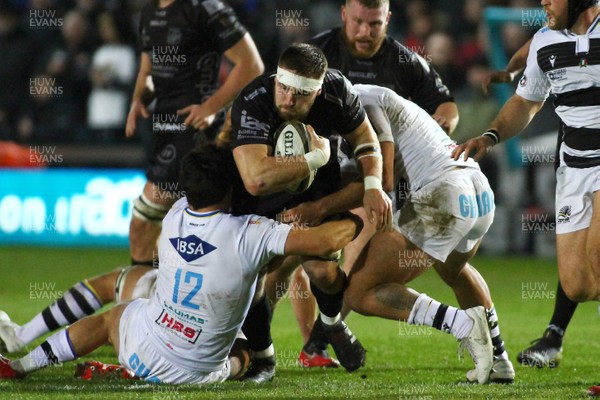 301119 - Dragons v Zebre- Guinness PRO14 -   Harrison Keddie of Dragons is tackled by Tomaso Bonti(12) and Marcello Violi of Zebre 