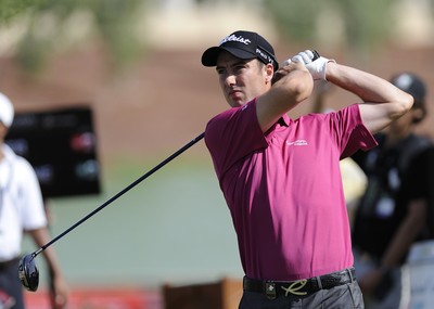 21.11.09 - Dubai World Championships 2009... Ross Fisher of England tees off on the 18th. 