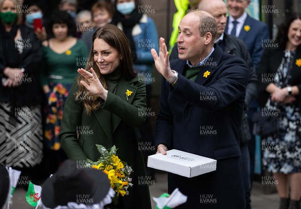 010322 - Picture shows the Duke and Duchess of Cambridge, Prince William and his wife Kate Middleton today meeting local school children as they leave Abergavenny Market today on St Davids Day in Wales