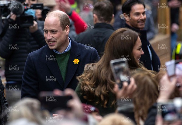 010322 - Picture shows the Duke and Duchess of Cambridge, Prince William and his wife Kate Middleton today meeting members of the public as they leave Abergavenny Market today on St Davids Day in Wales