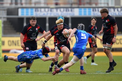 270426 - Dyffryn Taf v Bro Morgannwg - Road to Principality Finals - Boys U18s Cup - Charlie Reynolds of Dyffryn Taf  is challenged by Gethin Halsall of Bro Morgannwg