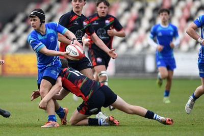 270426 - Dyffryn Taf v Bro Morgannwg - Road to Principality Finals - Boys U18s Cup - Richie Jenkins of Bro Morgannwg is challenged by Shay Morgan of Dyffryn Taf