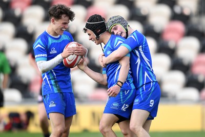 270426 - Dyffryn Taf v Bro Morgannwg - Road to Principality Finals - Boys U18s Cup - Richie Jenkins of Bro Morgannwg celebrates scoring a try with team mates
