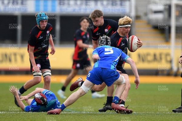 270426 - Dyffryn Taf v Bro Morgannwg - Road to Principality Finals - Boys U18s Cup - Charlie Reynolds of Dyffryn Taf  is challenged by Gethin Halsall of Bro Morgannwg