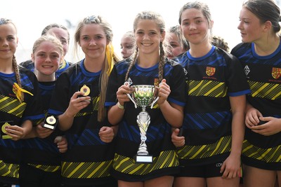 290426 - Dyffryn Taff v Bryncelynnog - Girls Schools Final U14 - Road To Principality Finals - Bryncelynnog players celebrate lifting the trophy at full time