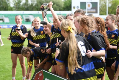 290426 - Dyffryn Taff v Bryncelynnog - Girls Schools Final U14 - Road To Principality Finals - Bryncelynnog players celebrate lifting the trophy at full time
