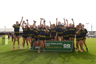 290426 - Dyffryn Taff v Bryncelynnog - Girls Schools Final U14 - Road To Principality Finals - Bryncelynnog players celebrate lifting the trophy at full time