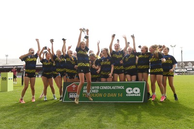 290426 - Dyffryn Taff v Bryncelynnog - Girls Schools Final U14 - Road To Principality Finals - Bryncelynnog players celebrate lifting the trophy at full time