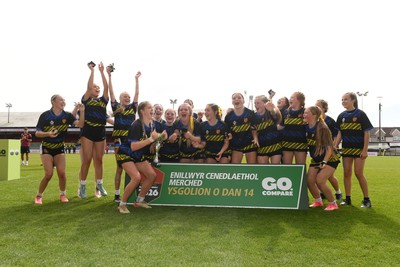 290426 - Dyffryn Taff v Bryncelynnog - Girls Schools Final U14 - Road To Principality Finals - Bryncelynnog players celebrate lifting the trophy at full time