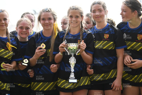 290426 - Dyffryn Taff v Bryncelynnog - Girls Schools Final U14 - Road To Principality Finals - Bryncelynnog players celebrate lifting the trophy at full time