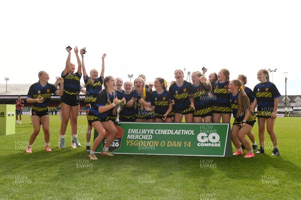 290426 - Dyffryn Taff v Bryncelynnog - Girls Schools Final U14 - Road To Principality Finals - Bryncelynnog players celebrate lifting the trophy at full time