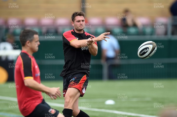 110818 - Ealing Trailfinders v Dragons - Preseason Friendly - Josh Lewis of the Dragons passes the ball during the warm up