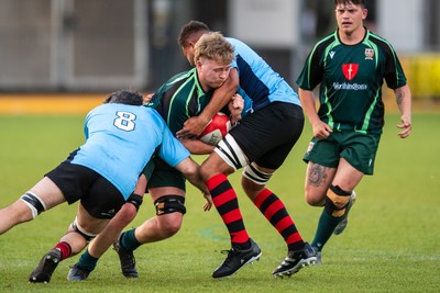 210525 - East District v Mid District - Inter District Cup Final - Issac Pritchard of Mid District is tackled by Rob Jones and Callum Samuel of East District