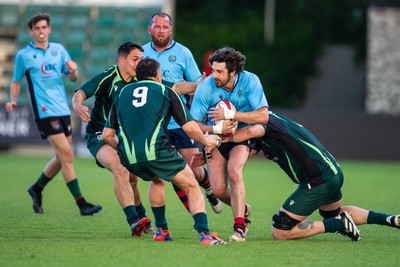 210525 - East District v Mid District - Inter District Cup Final - Troy Theaker of East District is tackled by Dan Smith of Mid District