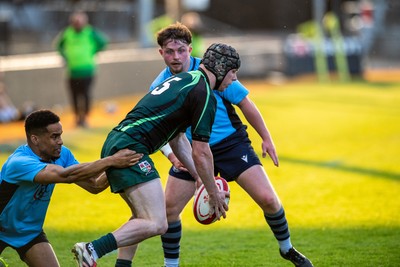 210525 - East District v Mid District - Inter District Cup Final - Macauley Jones of Mid District is tackled by Joel Garcia of East District