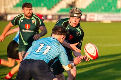 210525 - East District v Mid District - Inter District Cup Final - Macauley Jones of Mid District is tackled by Mackenzie Sinclair of East District