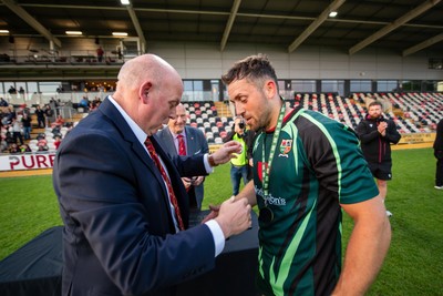 210525 - East District v Mid District - Inter District Cup Final - Mid District outside half Jordan Jones receives his winners medal and Man of the Match award