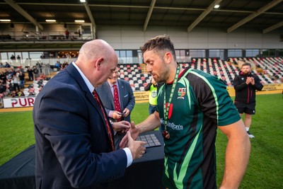 210525 - East District v Mid District - Inter District Cup Final - Mid District outside half Jordan Jones receives his winners medal and Man of the Match award