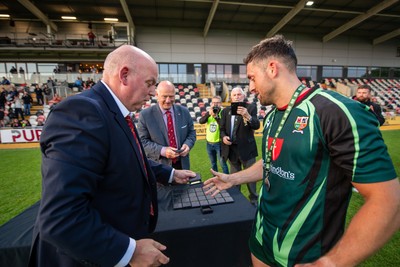 210525 - East District v Mid District - Inter District Cup Final - Mid District outside half Jordan Jones receives his winners medal and Man of the Match award
