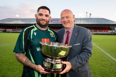 210525 - East District v Mid District - Inter District Cup Final - Mid District captain Adam Phillips receives the trophy from Terry Cobner