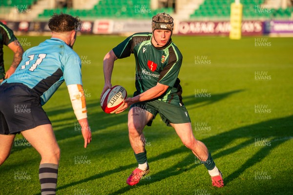210525 - East District v Mid District - Inter District Cup Final - Macauley Jones of Mid District is tackled by Mackenzie Sinclair of East District