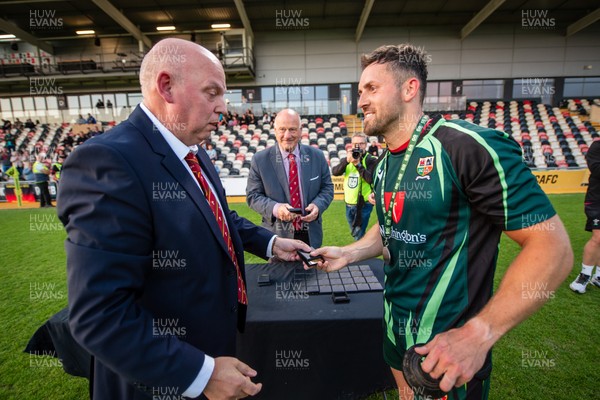 210525 - East District v Mid District - Inter District Cup Final - Mid District outside half Jordan Jones receives his winners medal and Man of the Match award